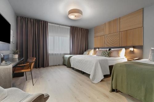 Habitación Cuádruple del hotel Konvin Hotel By Reykjavik Keflavik Airport. Foto 6