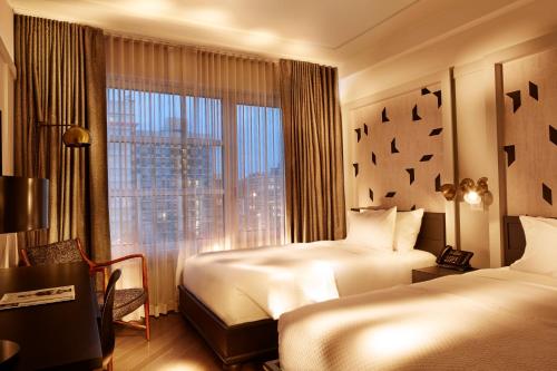 Alojamiento Ada Clásico - 2 camas del hotel The Tillary. Foto 1