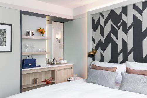 Habitación Deluxe con cama extragrande del hotel The Tillary. Foto 3