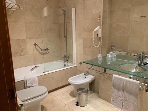 Habitación cuádruple del hotel Exe Gran Almenar. Foto 1