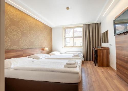 Habitación Triple del hotel Enziana Wien
