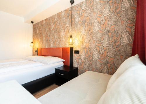 Habitación Triple del hotel Enziana Wien. Foto 8