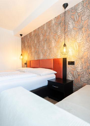 Habitación Triple del hotel Enziana Wien. Foto 9