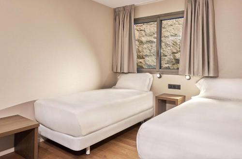 Habitación Cuádruple Familiar del hotel NH Andorra la Vella. Foto 2