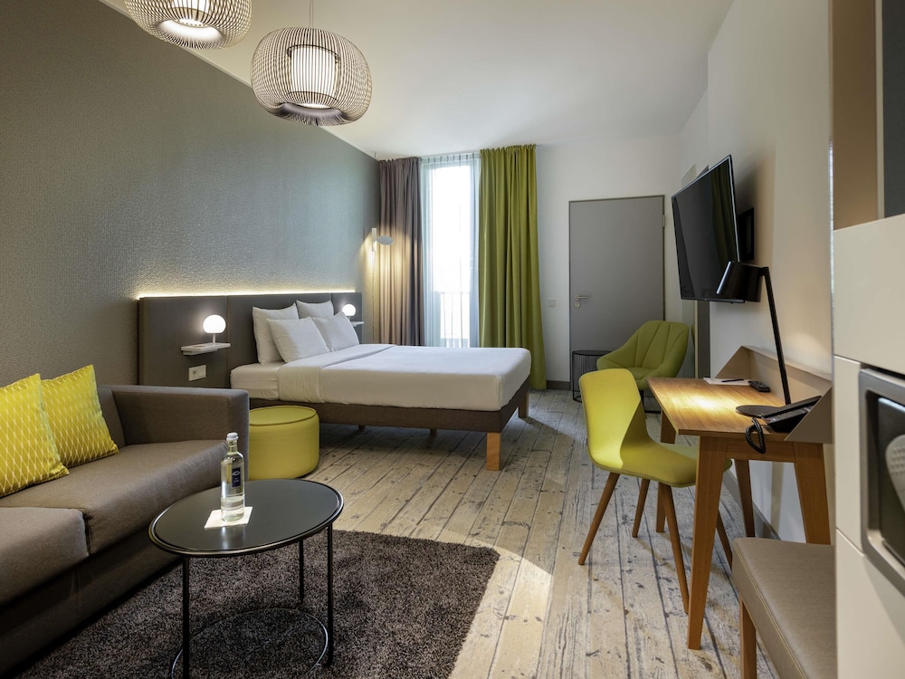 Habitación ejecutiva, 1 cama doble con sofá cama del hotel Novotel Muenchen Messe