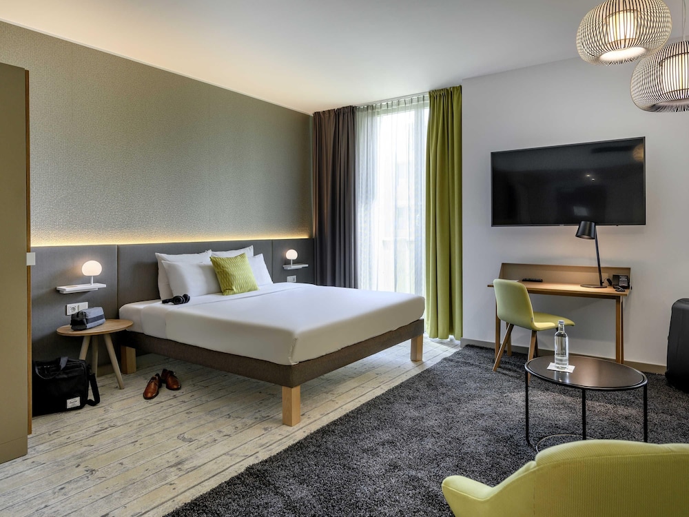 Habitación ejecutiva, 1 cama doble con sofá cama del hotel Novotel Muenchen Messe. Foto 1
