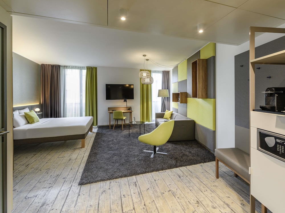 Habitación ejecutiva, 1 cama doble con sofá cama del hotel Novotel Muenchen Messe. Foto 3