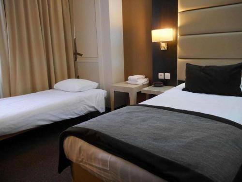 Habitación Triple Estándar del hotel Best Western City Centre. Foto 2