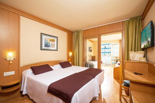 Suite Junior del hotel Guitart Central Park Aqua Resort. Foto 1