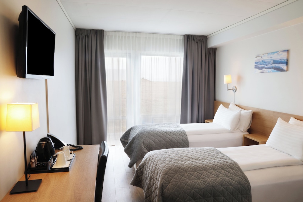 Habitación estándar con 1 cama doble o 2 individuales del hotel Fosshotel Núpar. Foto 1