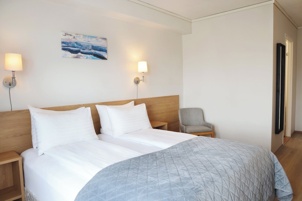 Habitación estándar con 1 cama doble o 2 individuales del hotel Fosshotel Núpar. Foto 2