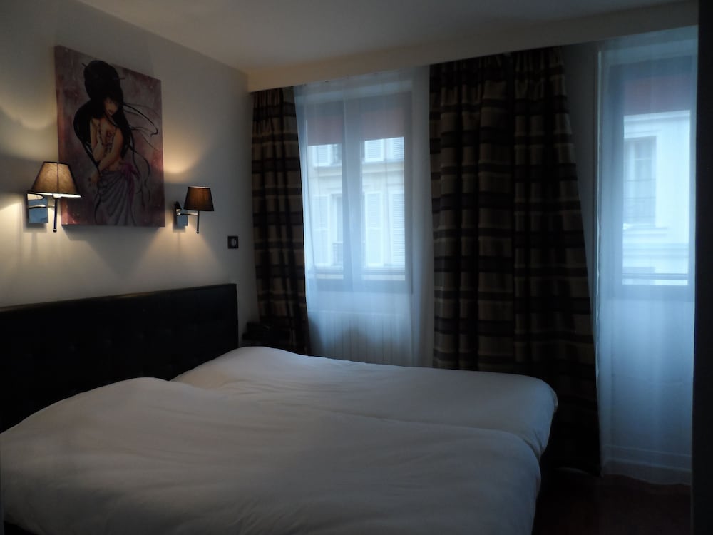 Habitación con 2 camas individuales del hotel Prince Monceau