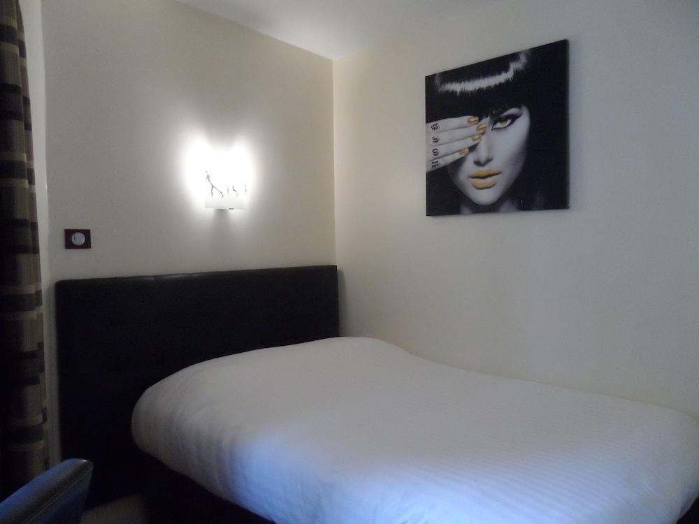 Habitación individual del hotel Prince Monceau. Foto 1