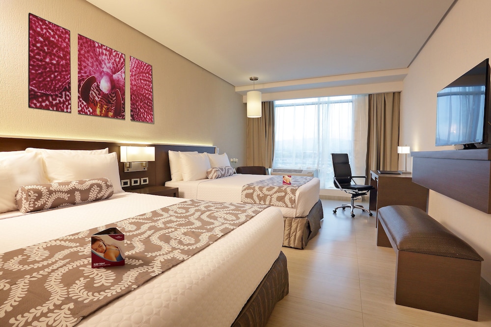 Habitación estándar, 2 camas de matrimonio del hotel Crowne Plaza Panama Airport. Foto 2