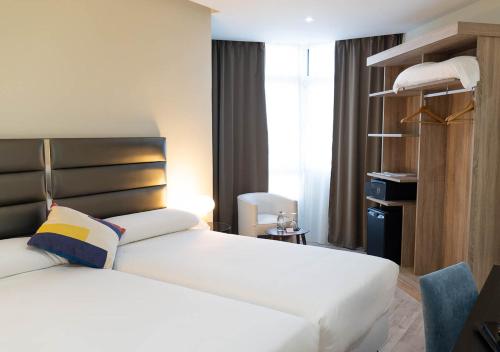 Habitación Doble Deluxe del hotel Pasarela. Foto 11