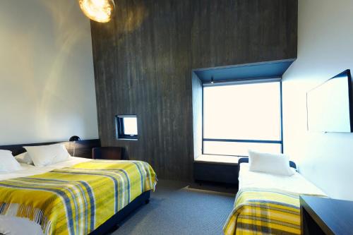 Habitación Triple del hotel Fosshotel Glacier Lagoon. Foto 1