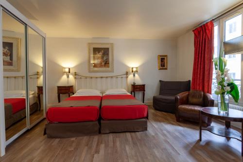 Habitación Triple Deluxe del hotel Atlantis Saint Germain Des Prés. Foto 2