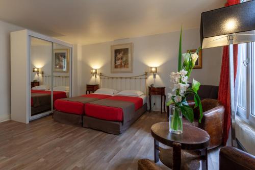 Habitación Triple Deluxe del hotel Atlantis Saint Germain Des Prés. Foto 3