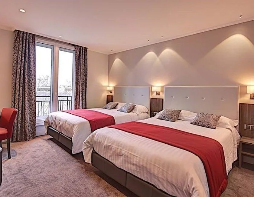Habitación Cuádruple del hotel Du Midi Paris Montparnasse. Foto 1