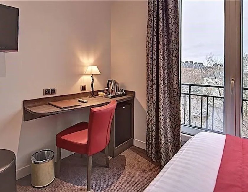 Habitación Cuádruple del hotel Du Midi Paris Montparnasse. Foto 2