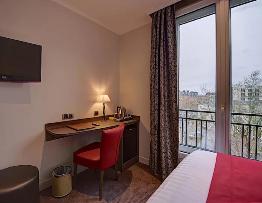 Habitación Cuádruple del hotel Du Midi Paris Montparnasse. Foto 3