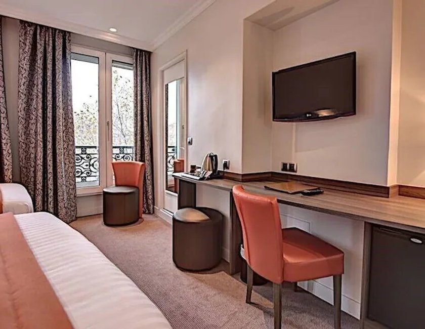 Habitación Triple Superior del hotel Du Midi Paris Montparnasse. Foto 3