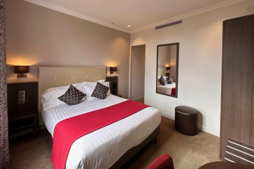 Habitación Doble Estándar del hotel Du Midi Paris Montparnasse. Foto 1