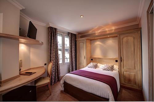 Habitación Doble Superior del hotel Du Midi Paris Montparnasse. Foto 1