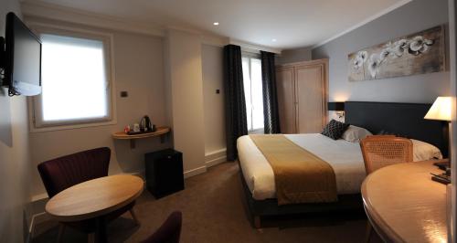 Habitación Doble Deluxe del hotel Du Midi Paris Montparnasse