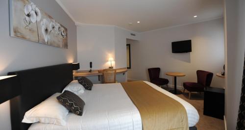 Habitación Doble Deluxe del hotel Du Midi Paris Montparnasse. Foto 1