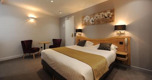 Habitación Doble Deluxe del hotel Du Midi Paris Montparnasse. Foto 3