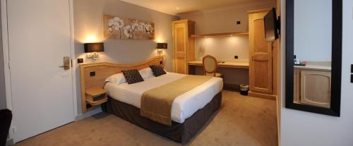 Habitación Doble Deluxe del hotel Du Midi Paris Montparnasse. Foto 7