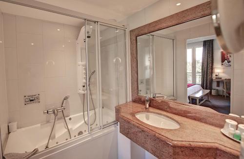 Suite Junior del hotel Du Midi Paris Montparnasse. Foto 1