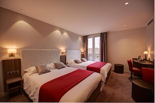 Habitación cuádruple del hotel Du Midi Paris Montparnasse. Foto 2