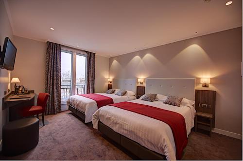Habitación cuádruple del hotel Du Midi Paris Montparnasse. Foto 3
