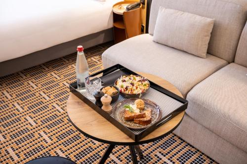 Quadruple Classic Room del hotel Mercure Paris Bercy Bibliothèque. Foto 6