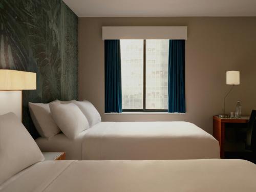 Habitación Estándar con 2 camas dobles del hotel The Cloud One New York-Downtown, by the Motel One Group