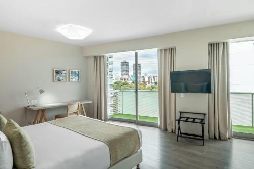 Habitación con cama grande - Adaptada para personas de movilidad reducida - No fumadores del hotel Dazzler By Wyndham Buenos Aires Polo. Foto 1