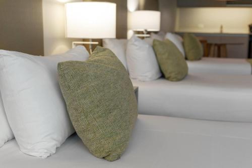 Habitación Clásica con 3 camas individuales - No fumadores del hotel Dazzler By Wyndham Buenos Aires Polo. Foto 4