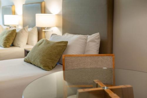 Habitación Clásica con 3 camas individuales - No fumadores del hotel Dazzler By Wyndham Buenos Aires Polo. Foto 5