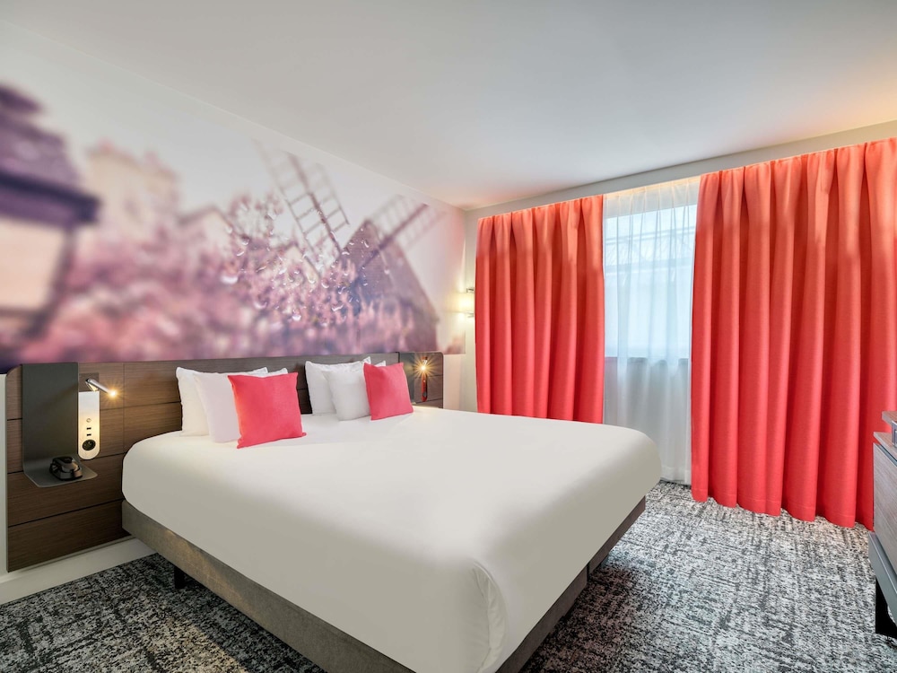 Habitación superior, 1 cama de matrimonio grande del hotel Novotel Paris Centre Bercy. Foto 1