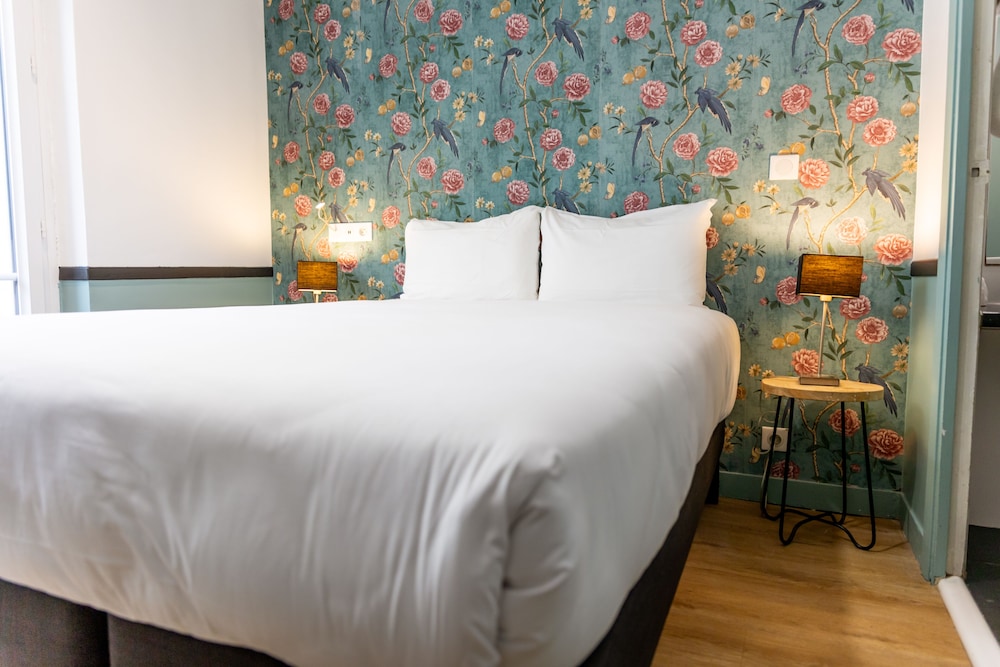 Habitación Doble Pequeña del hotel Vintage Paris Gare Du Nord By Hiphophostels. Foto 1