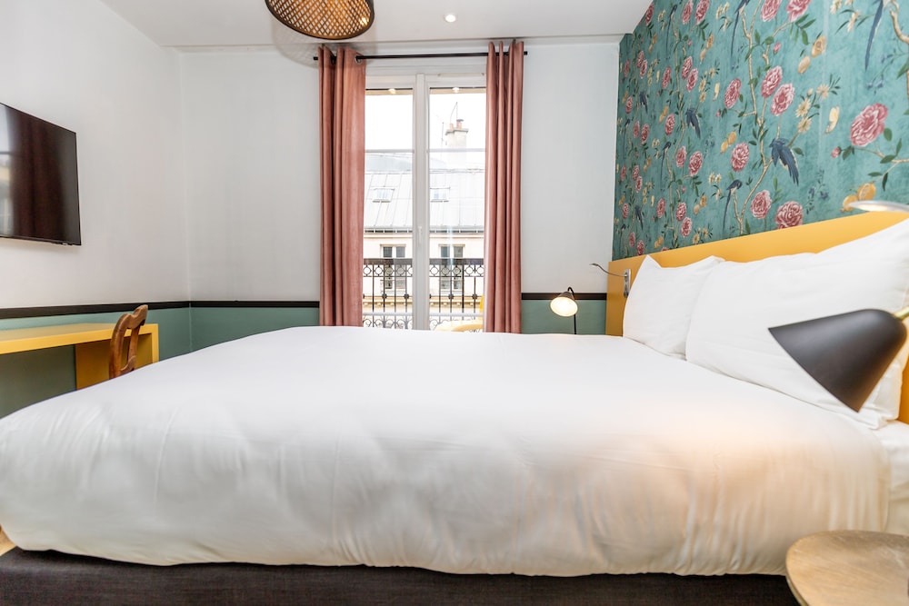 Habitación Doble Pequeña del hotel Vintage Paris Gare Du Nord By Hiphophostels. Foto 2