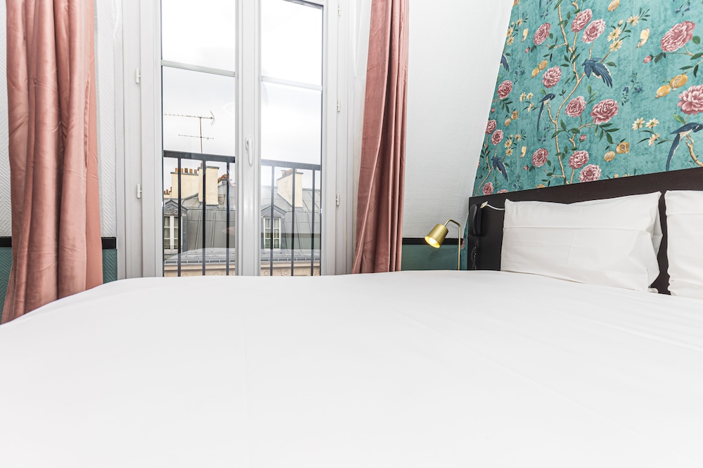 Habitación Doble Pequeña del hotel Vintage Paris Gare Du Nord By Hiphophostels. Foto 3