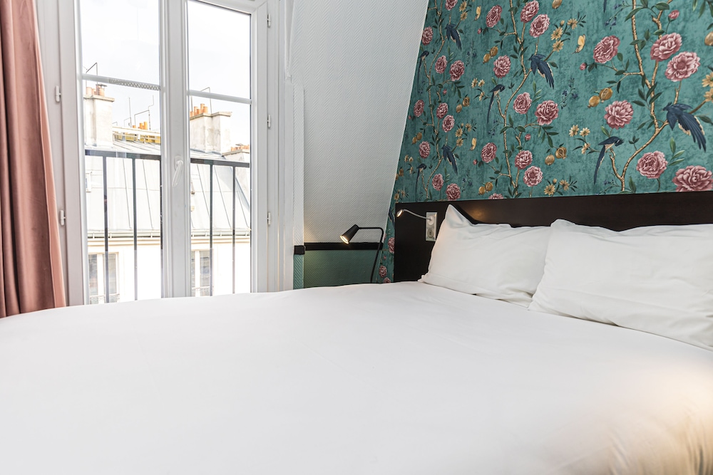 Habitación Doble Pequeña del hotel Vintage Paris Gare Du Nord By Hiphophostels. Foto 5
