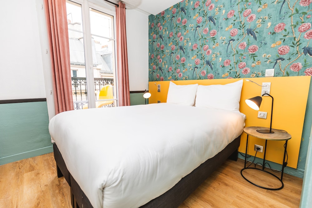 Habitación doble con balcón del hotel Vintage Paris Gare Du Nord By Hiphophostels. Foto 3
