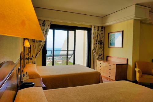 Habitación Doble con vistas laterales al mar - 1 o 2 camas del hotel Sbh Crystal Beach and Suites - Adults Only