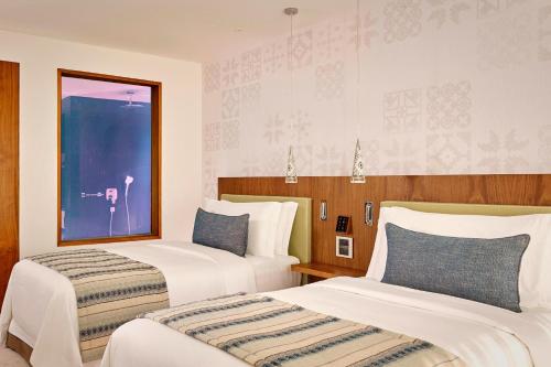 Habitación Doble Superior con balcón y vistas al mar - 2 camas del hotel Parklane, A Luxury Collection Resort and Spa, Limassol. Foto 2
