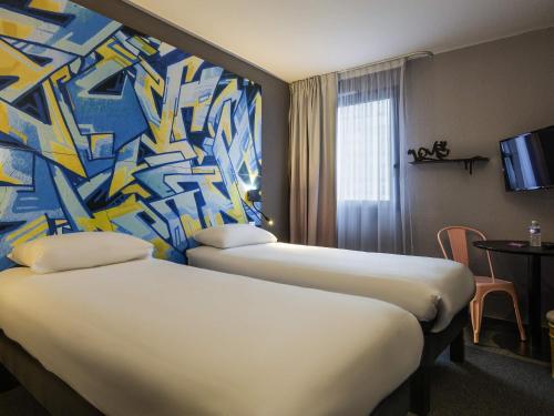 Habitación Doble Estándar - 2 camas del hotel Ibis Styles Toulouse Centre Canal du Mid