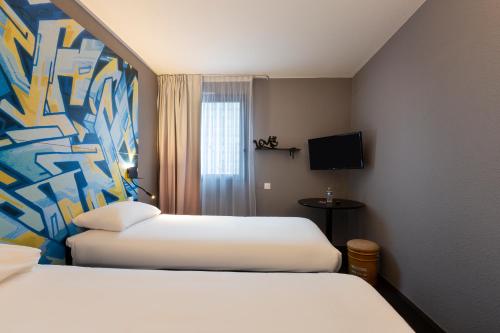 Habitación Doble Estándar - 2 camas del hotel Ibis Styles Toulouse Centre Canal du Mid. Foto 3